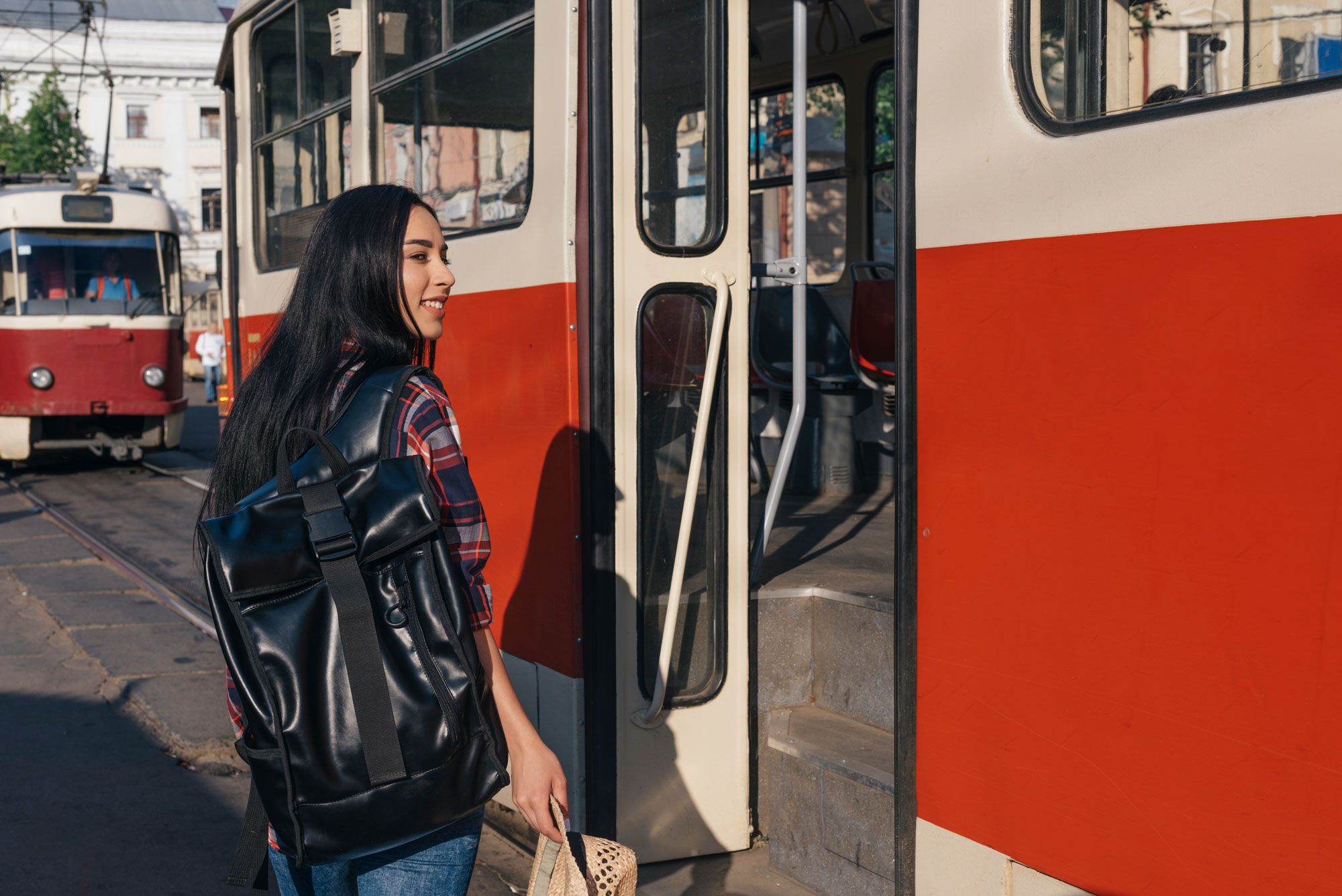 Young women about to board tram in Melbourne